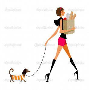side view of woman walking with dog