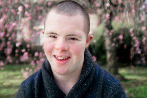 Young Man With Down Syndrome Smiling